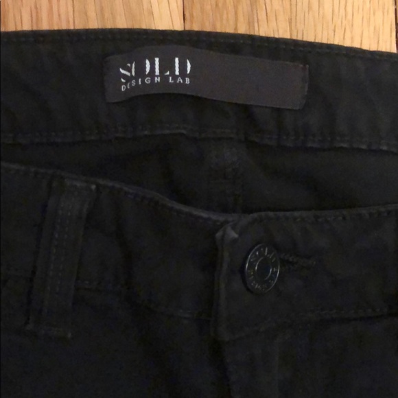 stretchy tapered black ankle pants as 29 - Picture 2 of 4